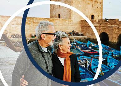 embracing senior couple exploring the port Essaouira